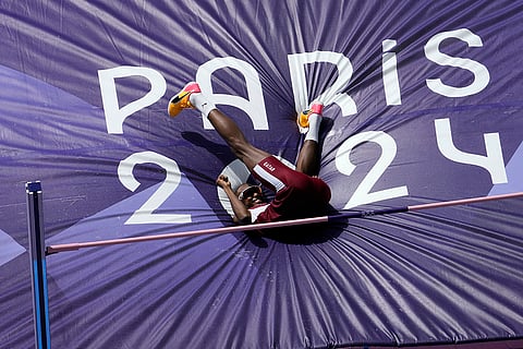 Mutaz Essa Barshim, of Qatar, competes in men's high jump qualification